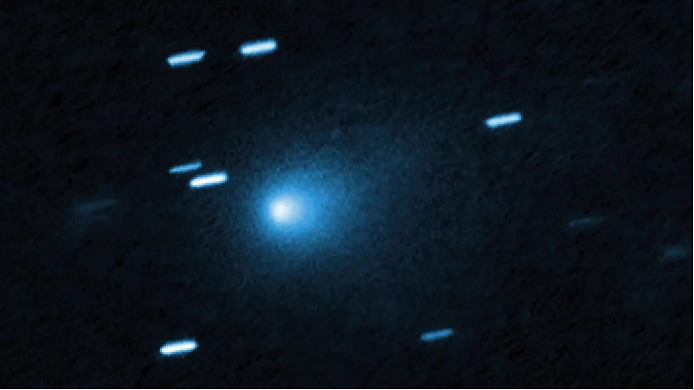 Hubble captured this image of the interstellar comet 3I/ATLAS on July 21, 2025, when the comet was 277 million miles from Earth. Hubble shows that the comet has a teardrop-shaped cocoon of dust coming off its solid, icy nucleus. Image: NASA, ESA, David Jewitt (UCLA); Image Processing: Joseph DePasquale (STScI).