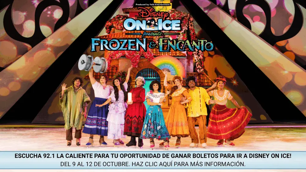 Promoción de Disney On Ice presenta Frozen y Encanto. En la imagen aparecen personajes de la película Encanto sobre el hielo, frente a un colorido escenario decorado con flores, un arcoíris y la casita mágica. En la parte inferior, el anuncio en español dice: 'Escucha 92.1 La Caliente para tu oportunidad de ganar boletos para ir a Disney On Ice. Del 9 al 12 de octubre. Haz clic aquí para más información.