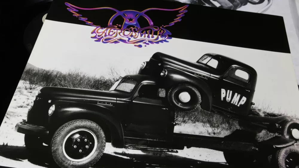 Closeup of rock band Aerosmith vinyl record album cover Pump from 1989 (focus on center)