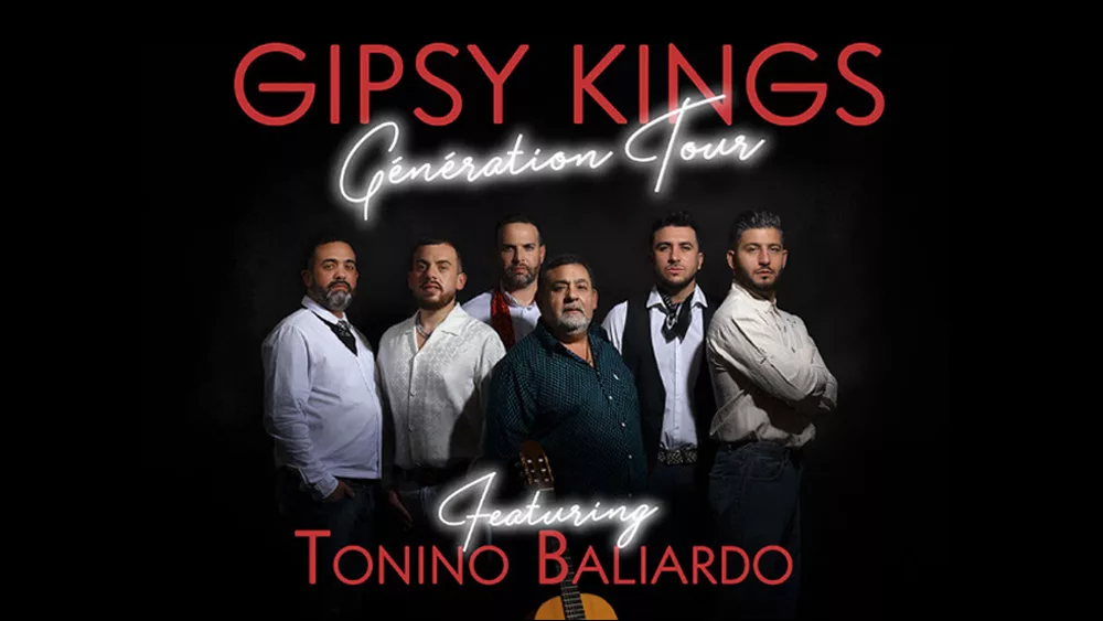 Gipsy Kings crew shot with the name of their tour in a neon type face right above them