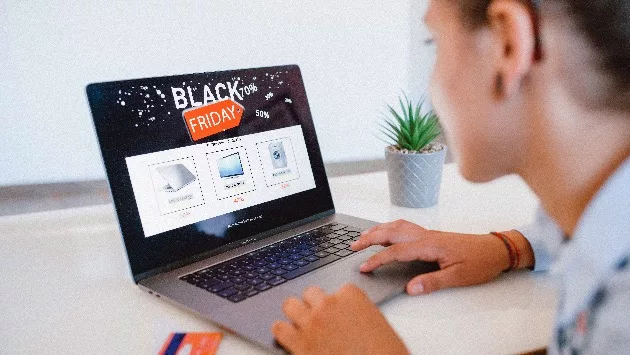 woman-is-shopping-electronics-online-at-black-friday
