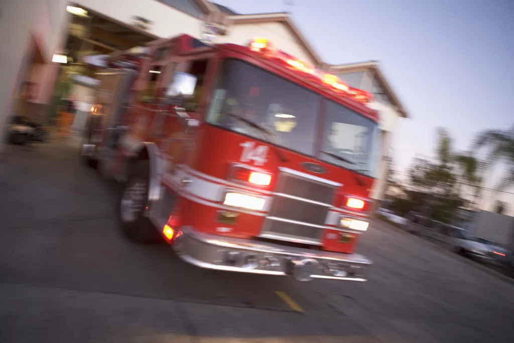 fire-engine-rushing-out-of-a-fire-station