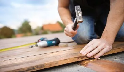 handyman-installing-wooden-flooring-3