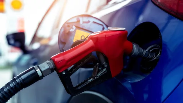car-fueling-at-gas-station-refuel-fill-up-with-petrol-gasoline-petrol-pump-filling-fuel-nozzle-in-fuel-tank-of-car-at-gas-station-petrol-industry-and-service-petrol-price-and-oil-crisis-concept