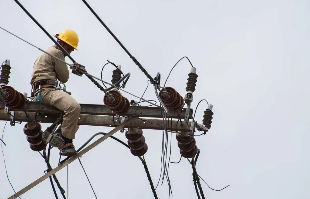 an-electrical-lineman-working-on-a-line-3