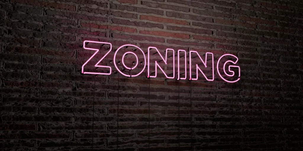 zoning-realistic-neon-sign-on-brick-wall-background