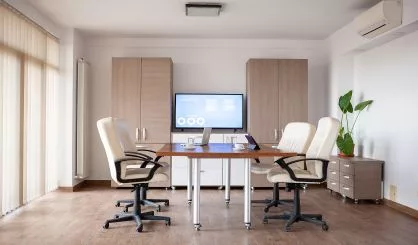 empty-conference-room-in-business-center-with-a-tv-in-background-2