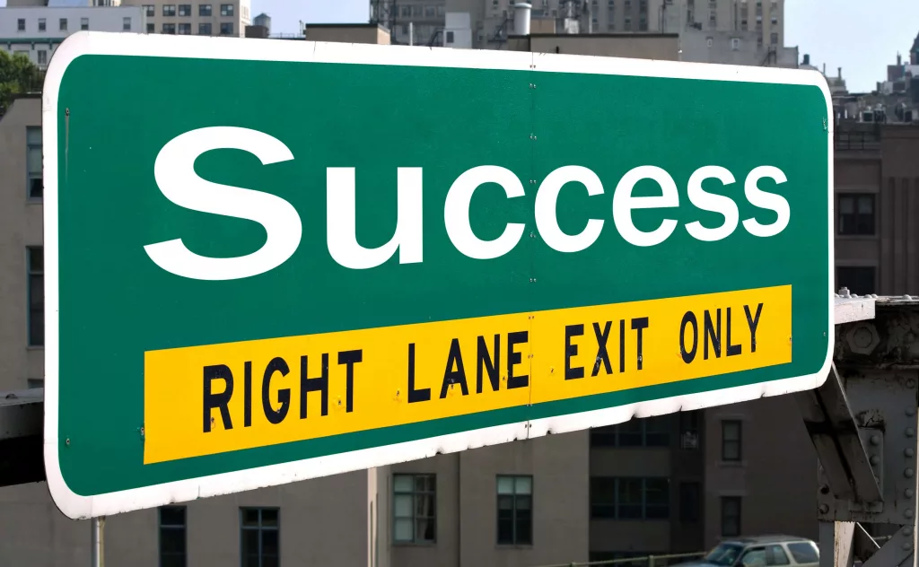success-highway-sign