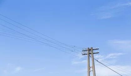 old-electricity-post-with-blue-sky
