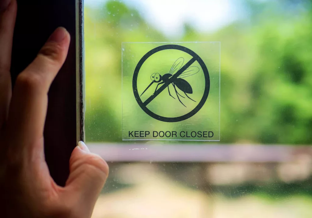 mosquito-keep-door-closed-a-door-with-a-symbol-mosquito-danger