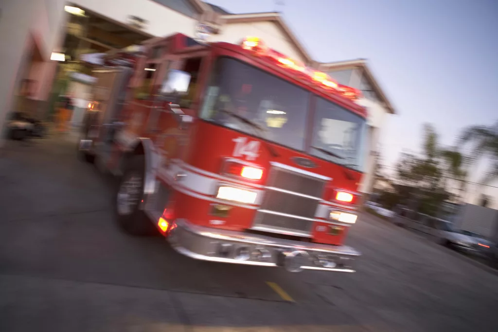 fire-engine-rushing-out-of-a-fire-station-2