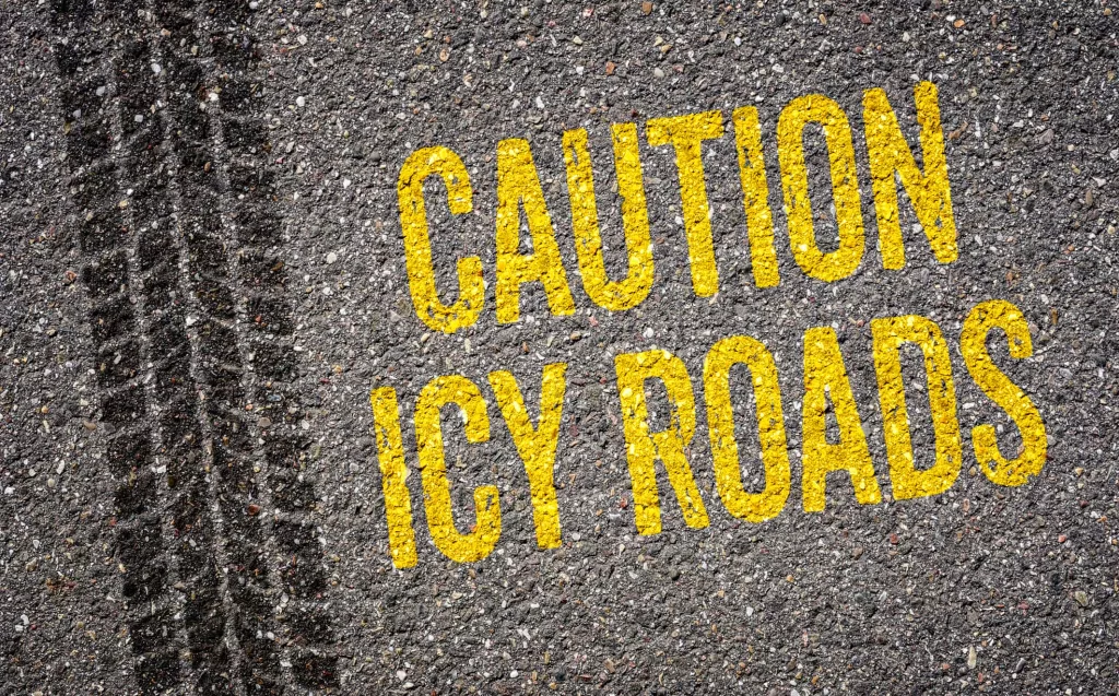 lane-with-the-text-caution-icy-roads