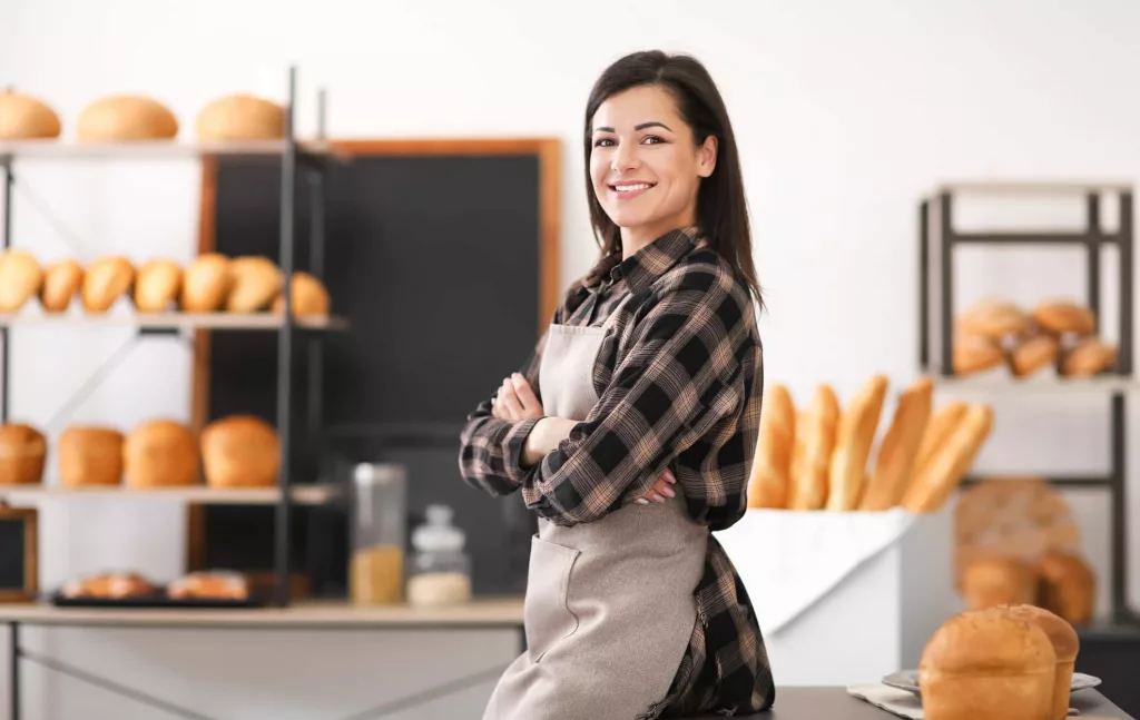 portrait-of-young-woman-in-bakery-small-business-owner