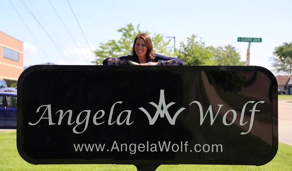 Angela Woolf @ sign