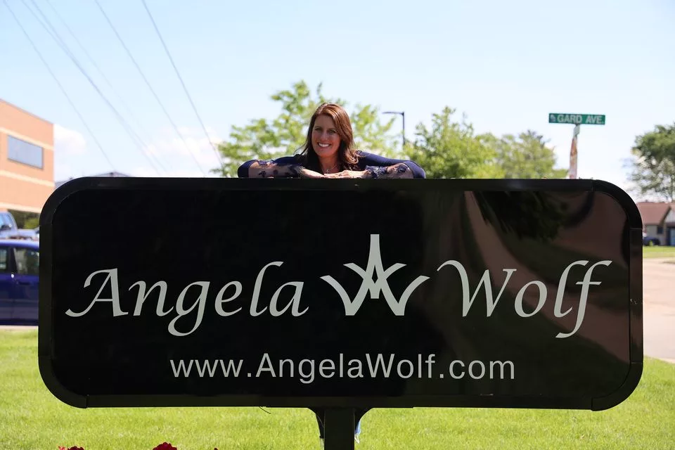 Angela Woolf @ sign