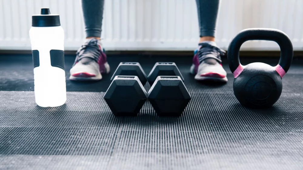 closeup-image-of-a-woman-sitting-at-gym