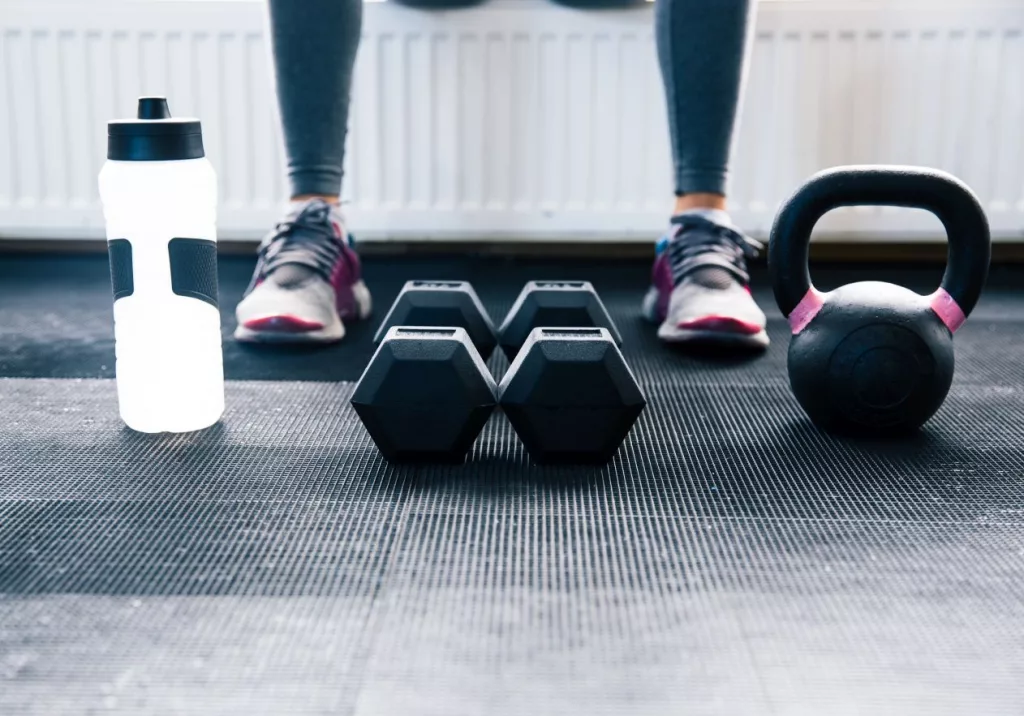 closeup-image-of-a-woman-sitting-at-gym