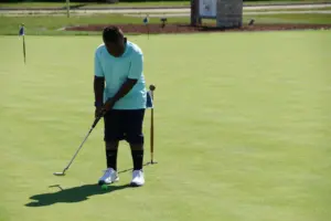 wee course kid putting