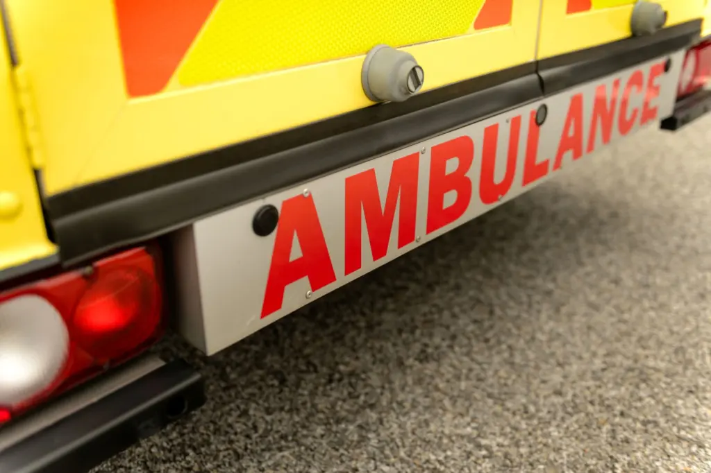 ambulance-car-from-behind-sign