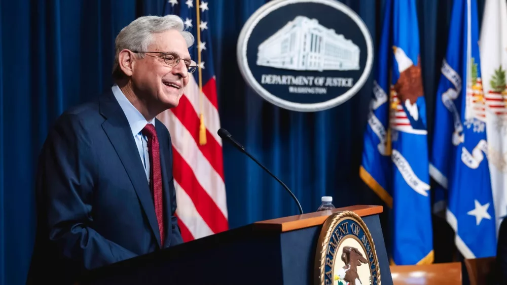 United States Attorney General^ Merrick Garland delivering a speech behind a podium with a mic. Washington D.C.^ USA - Oct 26 2023