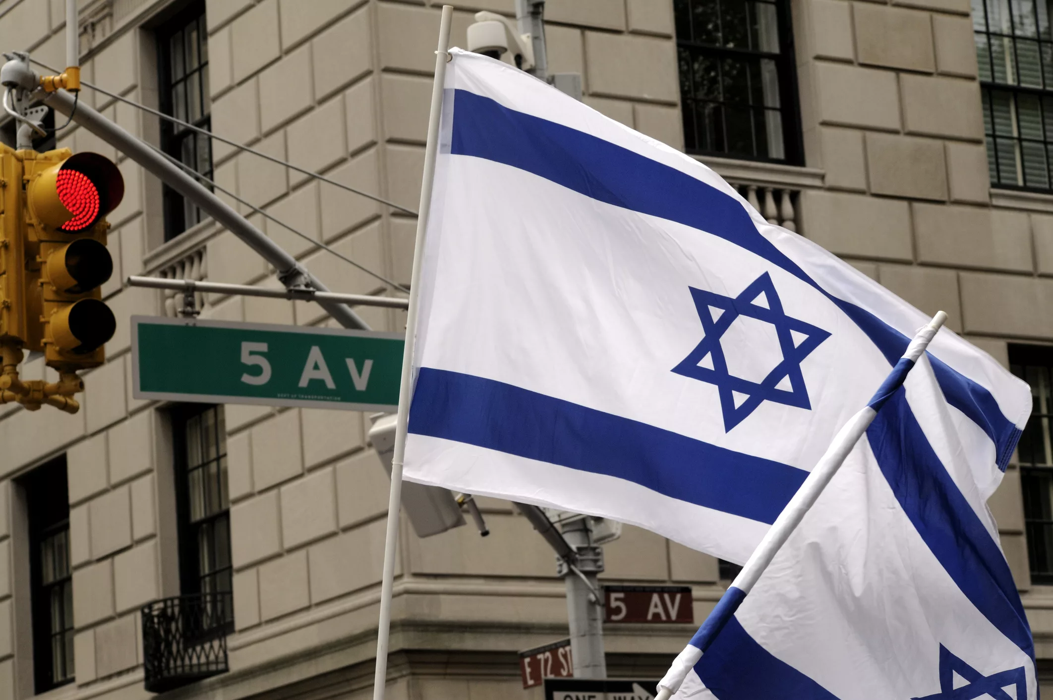 MANHATTAN, UNITED STATES - June 5, 2011: Israeli flags wave high above 5th Avenue during the Celebrate Israel Parade.