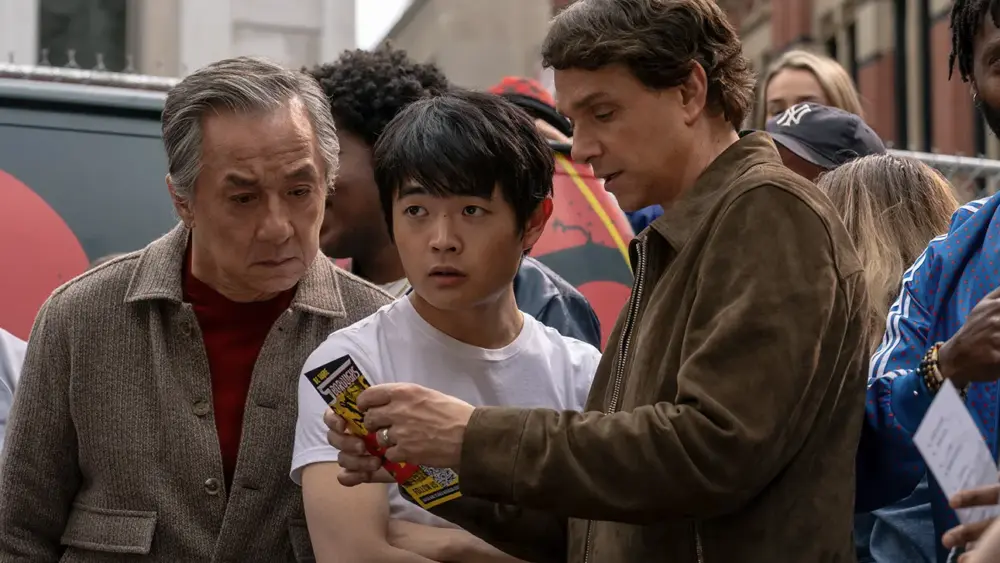 Jackie Chan (left), Ben Wang and Ralph Macchio in 'Karate Kid: Legends.' Jonathan Wenk/Columbia Pictures