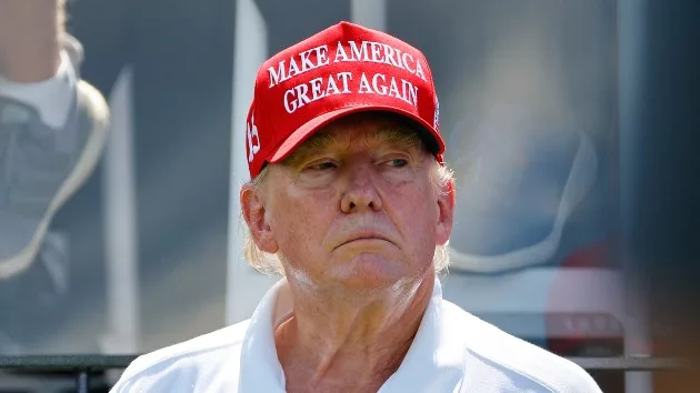 getty_81723_trumpmagahat201400