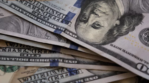 gettyrf_72222_cash100bills2028129815340