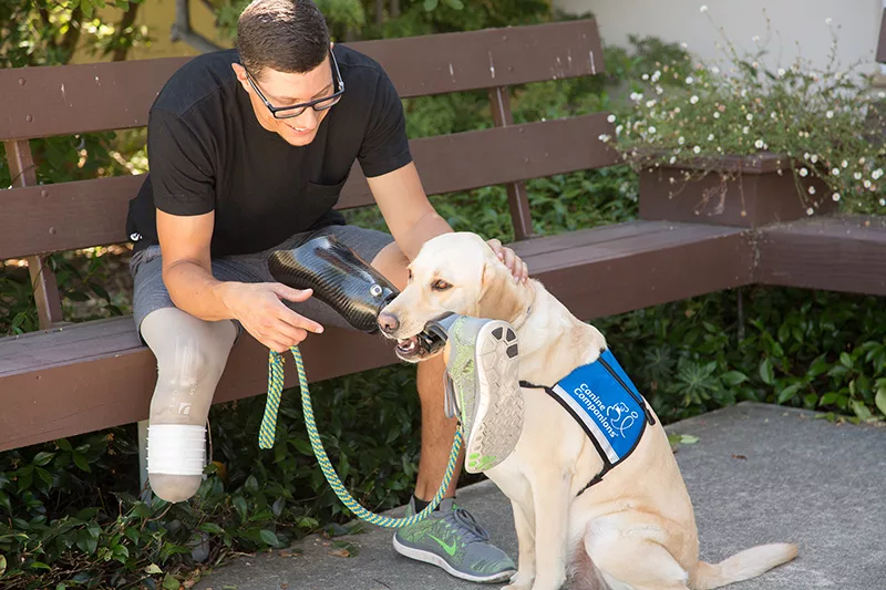 Trained Canine Companions service dogs assist people with physical,mental challenges