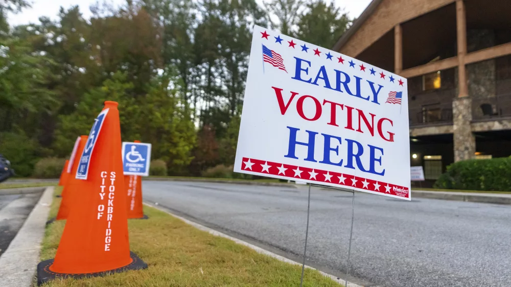 An Early Voting sign is seen outside of a polling station, Thursday, Oct. 31, 2024, in Stockbridge, Ga. (AP Photo/Jason Allen)