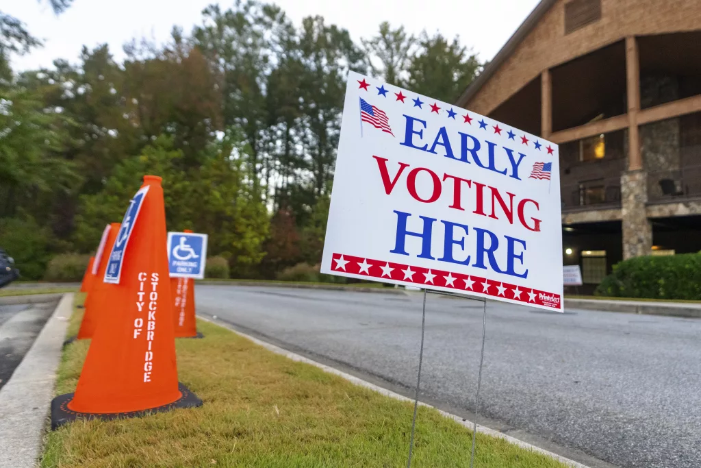 An Early Voting sign is seen outside of a polling station, Thursday, Oct. 31, 2024, in Stockbridge, Ga. (AP Photo/Jason Allen)