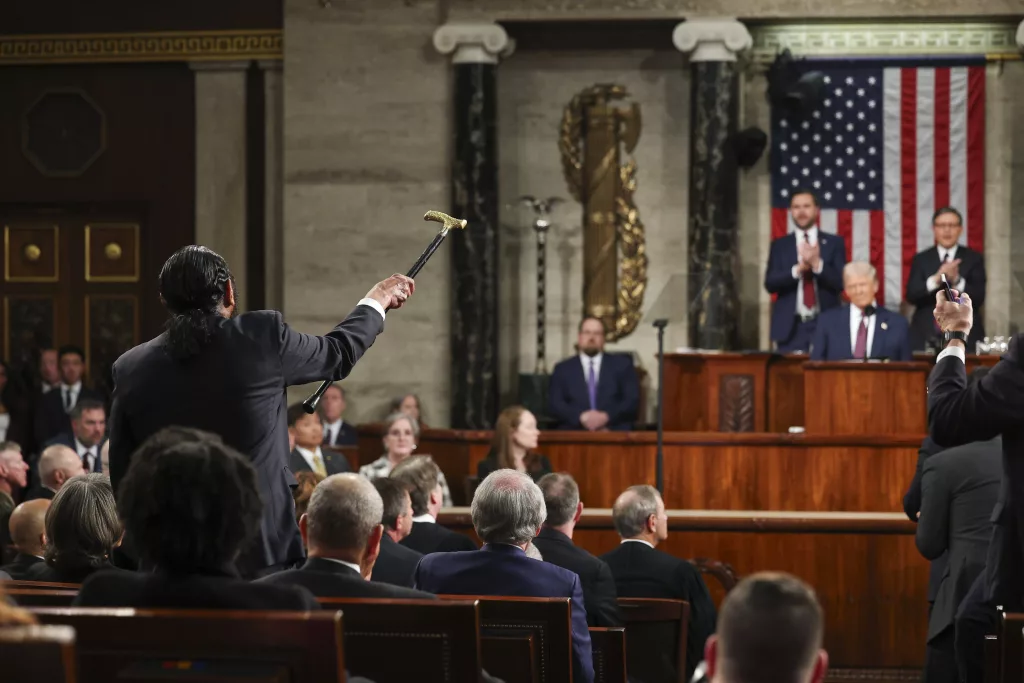 Rep. Al Green, D-Texas, left, shouts as President Donald Trump addresses a joint session of Congress at the Capitol in Washington, Tuesday, March 4, 2025. (Win McNamee/Pool Photo via AP)