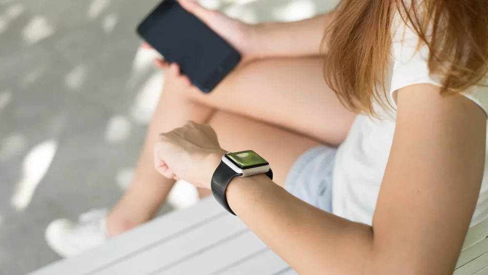 Woman with Phone and watch