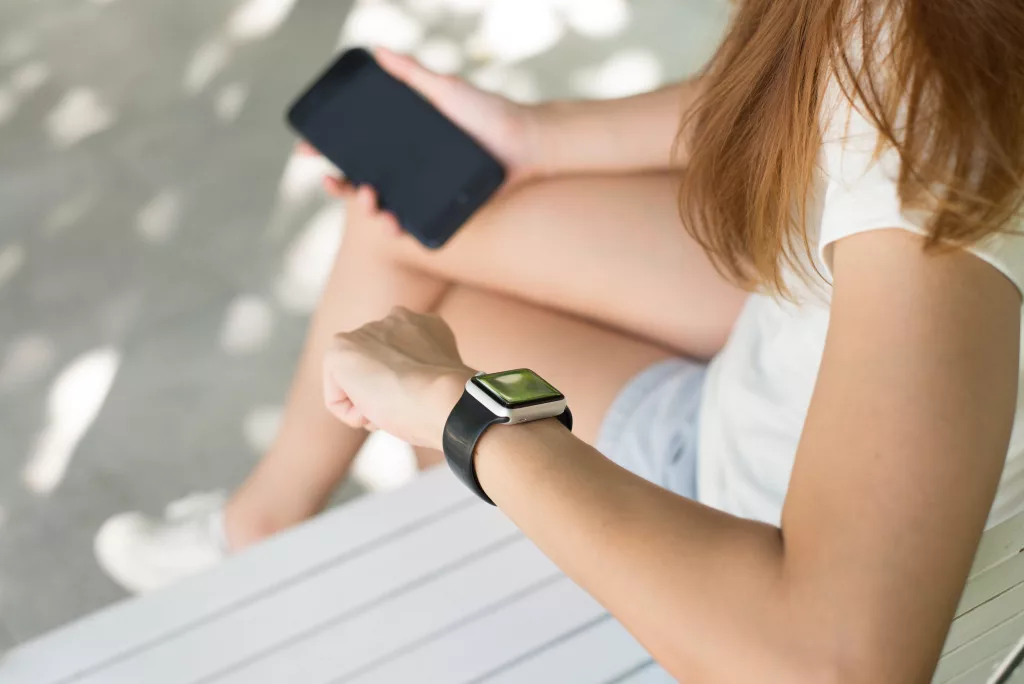 Woman with Phone and watch