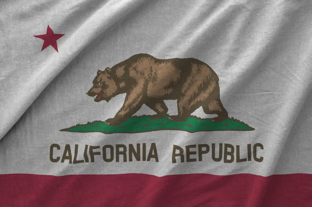 california-us-state-flag-depicted-on-folded-wavy-fabric-of-old-cloth