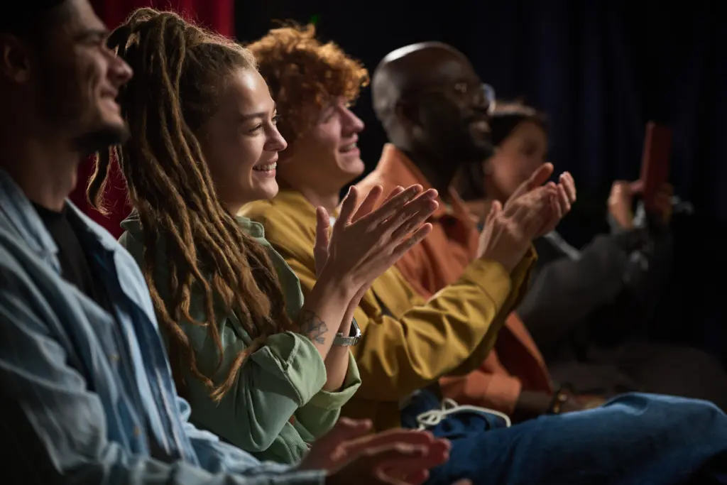 applauding-audience-watching-performances-enthusiastically