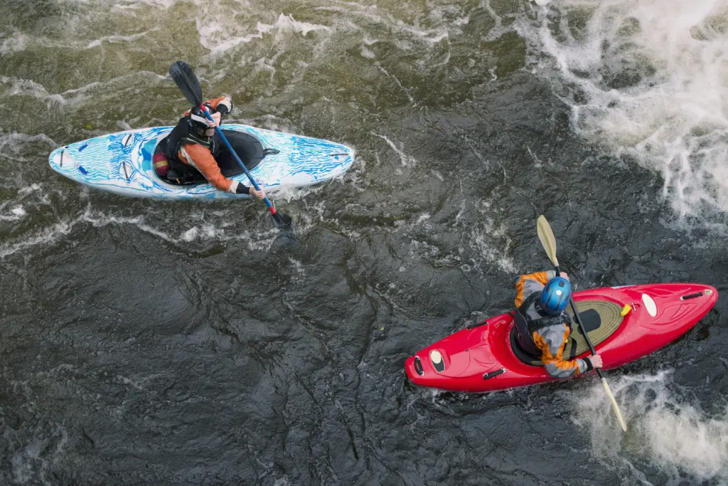 overhead-view-of-two-kayakers-paddling-river-dee-rapids