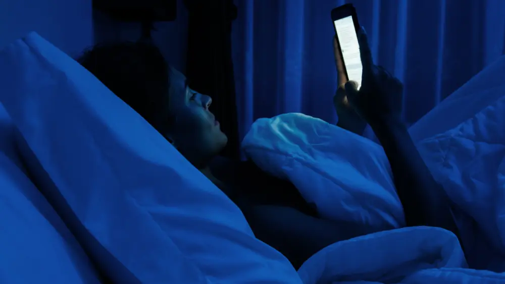 smartphone in bed