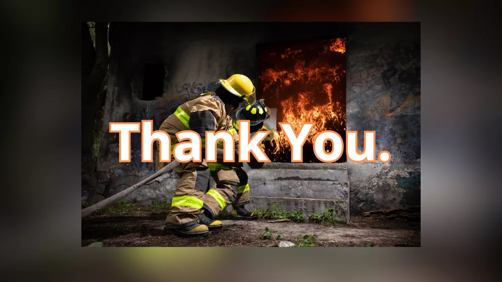 Thank you over an image of a firefighter fighting a blaze