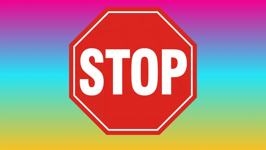 A stop sign on a colorful background.