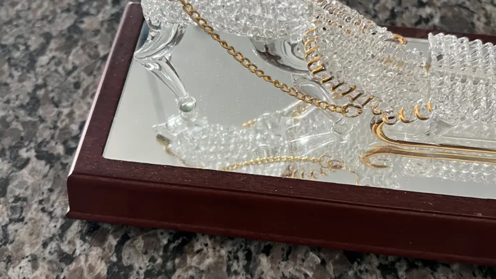 A broken reindeer Christmas ornament.