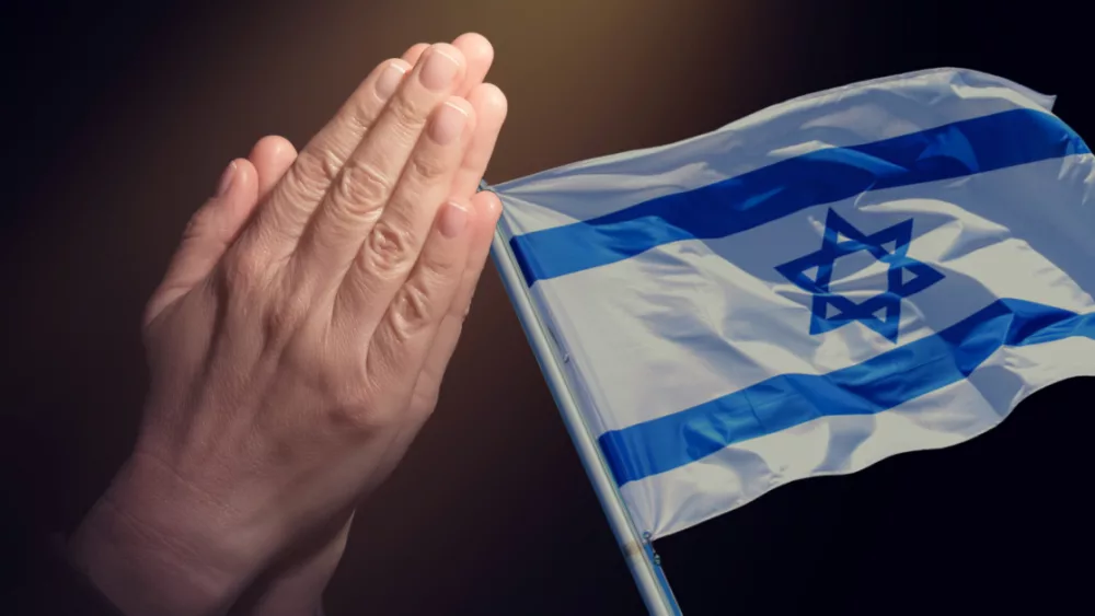 30655-israel-flag-gettyimages-olegda88-prayer-hands_source_file344690