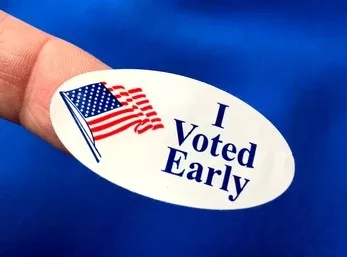 voted-early-sticker-on-finger-260nw-1210618807