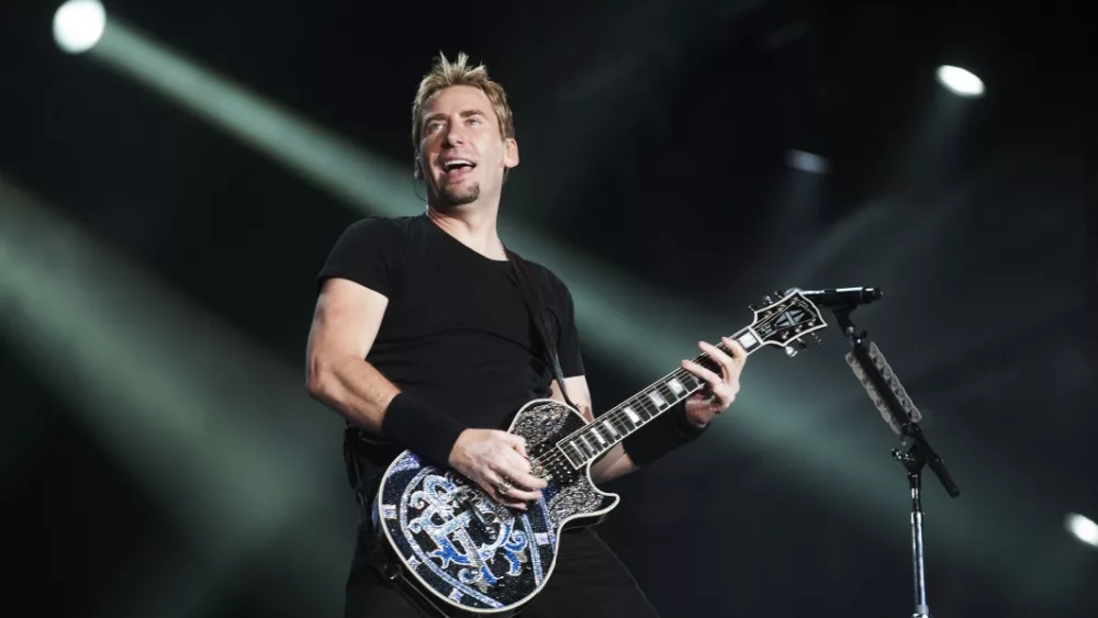 Chad Kroege of Nickelback performs during the Rock in Rio 2013 concert^ on September 20^ 2013 in Rio de Janeiro^ Brazil.