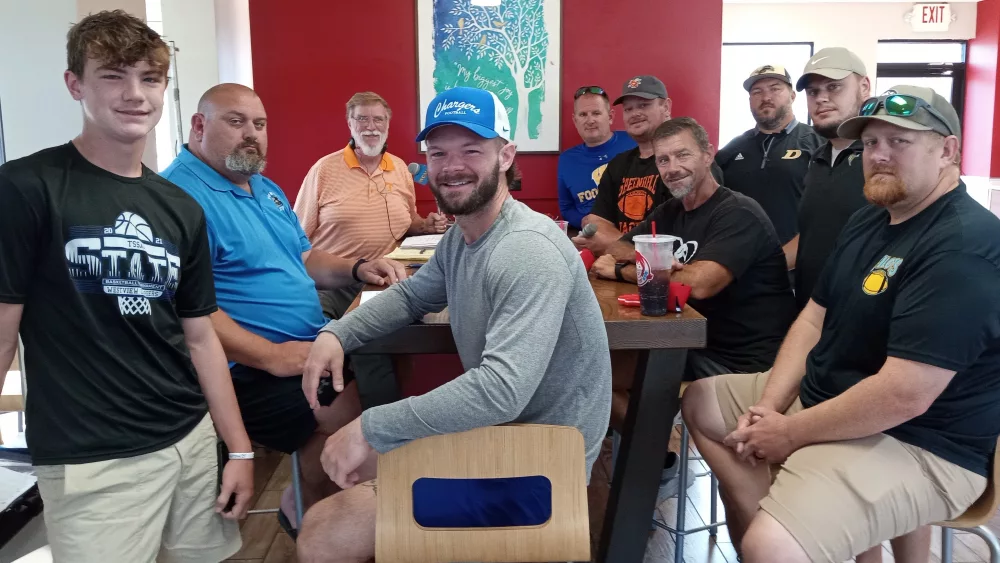 Host Paul Tinkle with area coaches and guests at the season premiere of "Coaches Corner" at Wendy's in Martin on Aug. 17, 2024.