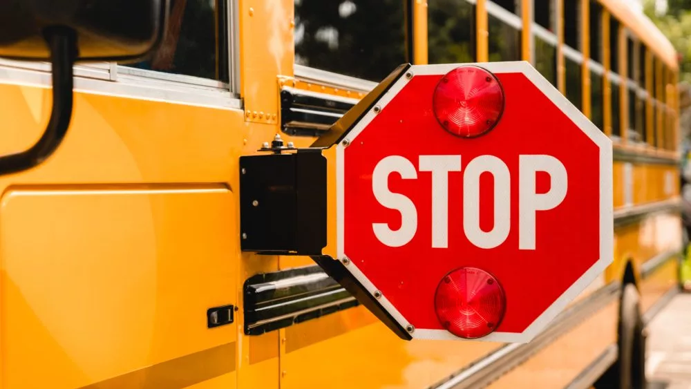 yellowschoolbus-stopsign-becarefulschoolchildrencrossingthe