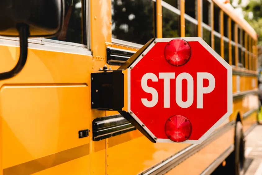 yellowschoolbus-stopsign-becarefulschoolchildrencrossingthe