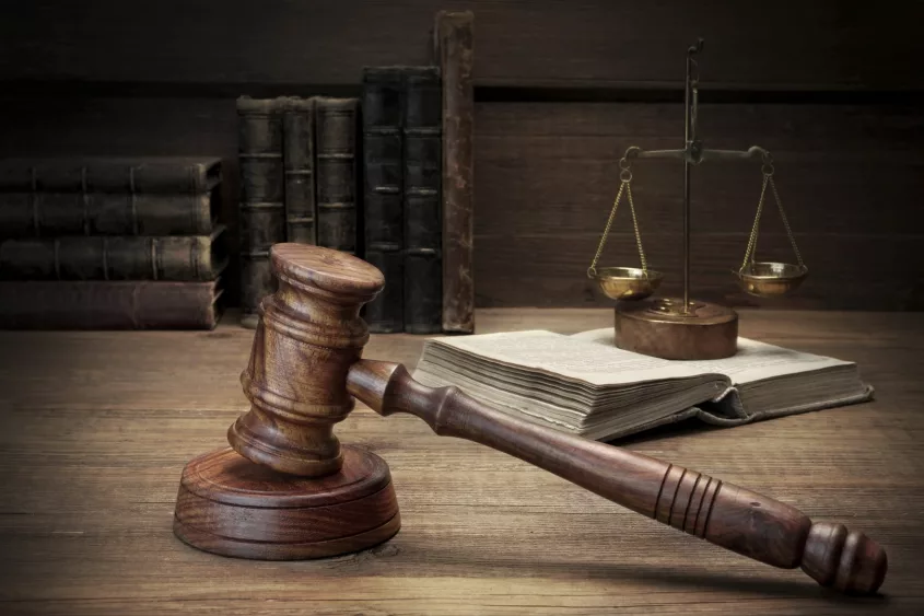 judges-gavel-legal-code-and-scales-of-justice-closeup-2