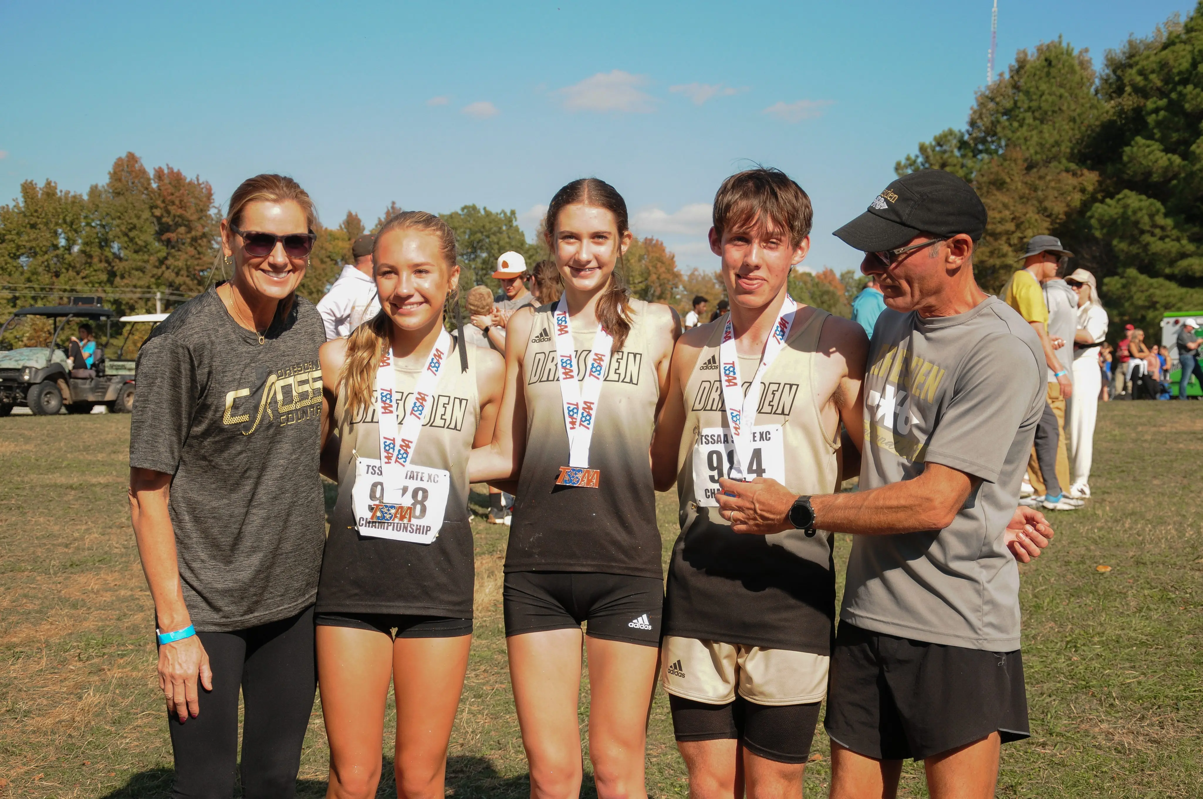 dresden-state-medalists-with-coaches-todd-and-wendi-maxie
