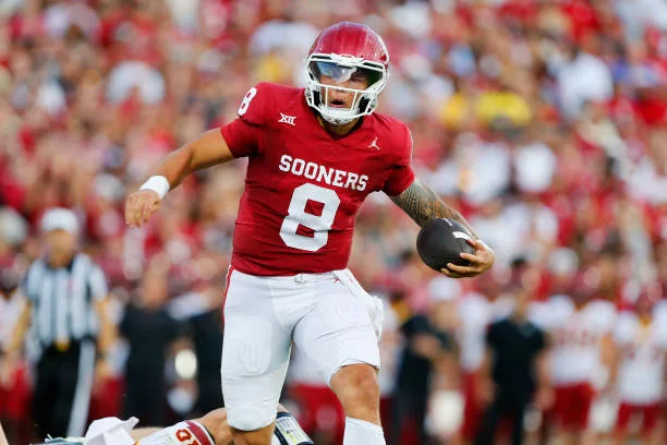 quarterback-dillon-gabriel-of-the-oklahoma-sooners-breaks-past-a-tackle-to-score-a-one-yard482713